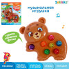 Музыкальная развивающая игрушка Мишка со светом фото 1 &mdash; МамаЭмма